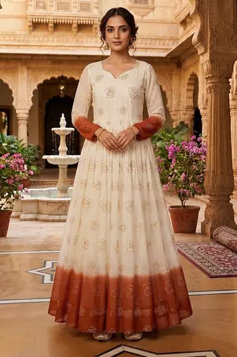 Rust color silver crunchy fabric designer embroidered gown for ethnic party looks