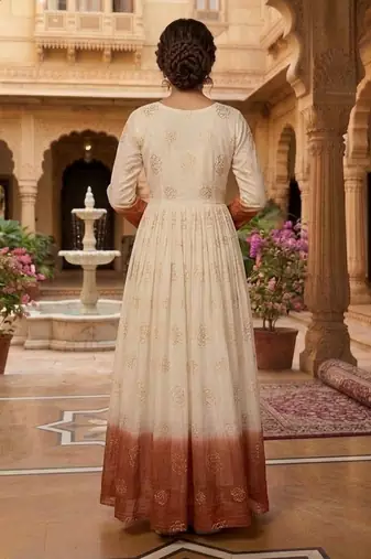 Rust color silver crunchy fabric designer embroidered gown for ethnic party looks