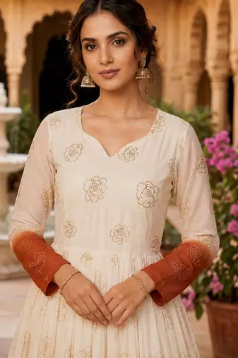 Rust color silver crunchy fabric designer embroidered gown for ethnic party looks
