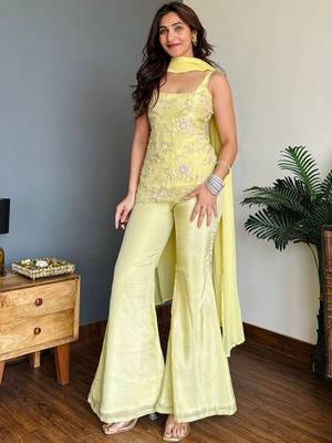 Yellow color faux georgette fabric designer ceremonial salwar suit for girlie party looks 1