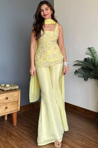 Yellow color faux georgette fabric designer ceremonial salwar suit for girlie party looks