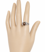Black pearl finger ring with silver filigree band, adjustable