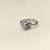 Pearl finger ring with cz accents, silver-tone, adjustable.