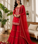 Red faux georgette sharara suit set with sequins work dupatta
