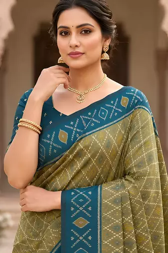 Green color patola silk saree with special woven meenakari jacquard designer saree