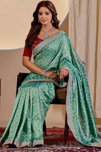 Sea green color smart art silk saree with embroidered work and table printed bandhej traditonal saree