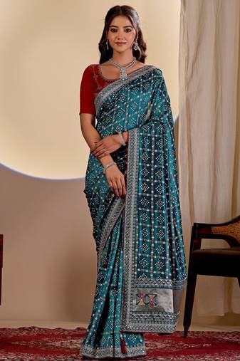 Teal blue color smart art silk saree with embroidered work and table printed bandhej traditonal saree