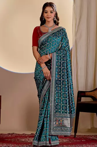 Teal blue color smart art silk saree with embroidered work and table printed bandhej traditonal saree
