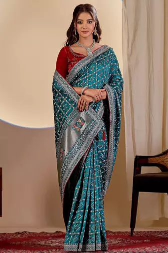 Teal blue color smart art silk saree with embroidered work and table printed bandhej traditonal saree