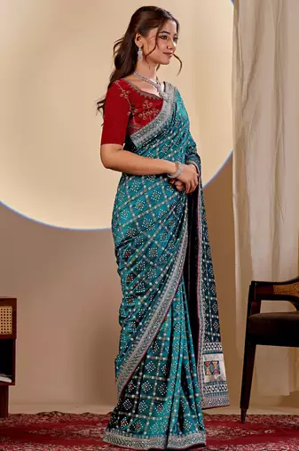 Teal blue color smart art silk saree with embroidered work and table printed bandhej traditonal saree