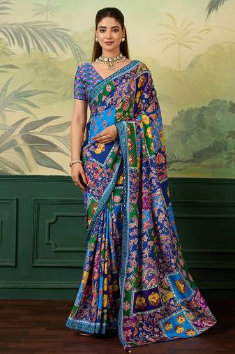 Blue color elegant crepe silk saree with designer print design and trendy mirror work