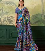 Blue color elegant crepe silk saree with designer print design and trendy mirror work