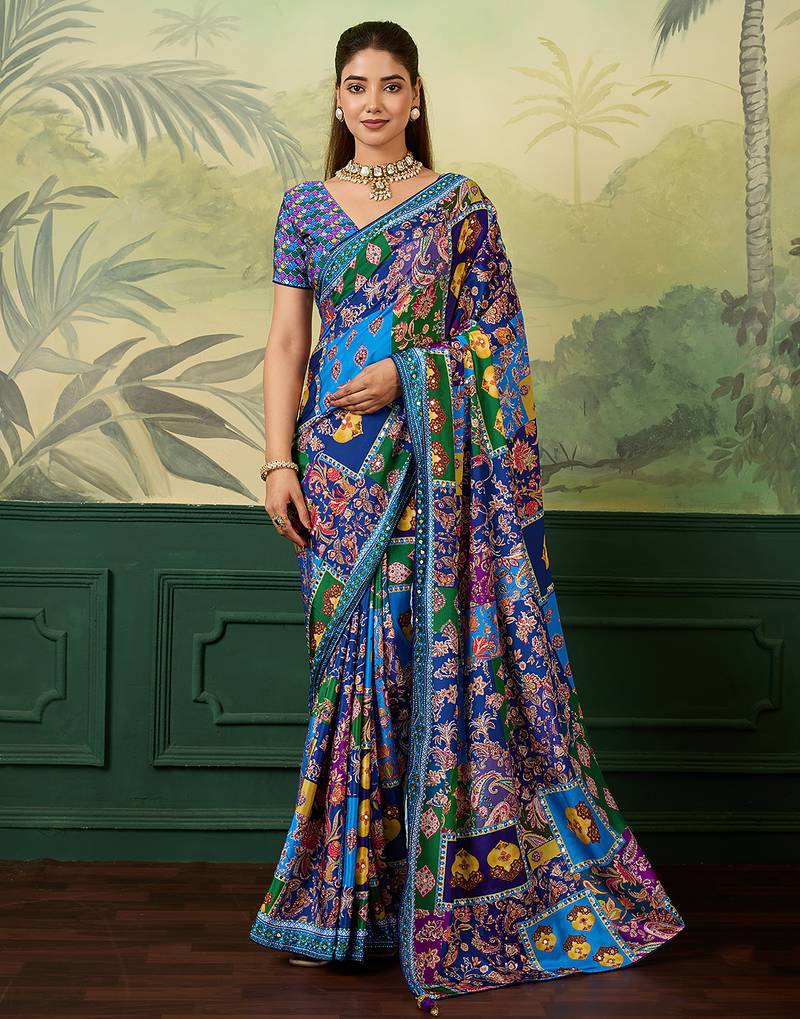 Blue color elegant crepe silk saree with designer print design and trendy mirror work