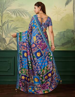 Blue color elegant crepe silk saree with designer print design and trendy mirror work 2
