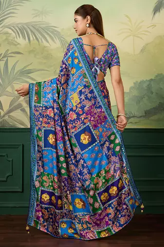 Blue color elegant crepe silk saree with designer print design and trendy mirror work