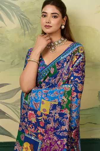 Blue color elegant crepe silk saree with designer print design and trendy mirror work