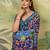 Blue color elegant crepe silk saree with designer print design and trendy mirror work