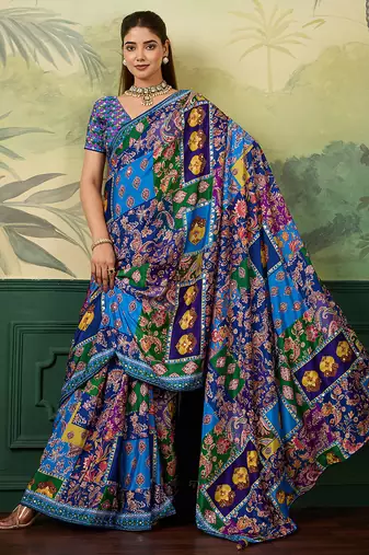 Blue color elegant crepe silk saree with designer print design and trendy mirror work