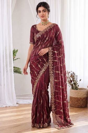 Maroon color elegant space silk fabric rich looks embroidered saree