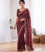 Maroon color elegant space silk fabric rich looks embroidered saree