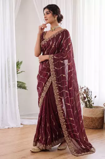Maroon color elegant space silk fabric rich looks embroidered saree