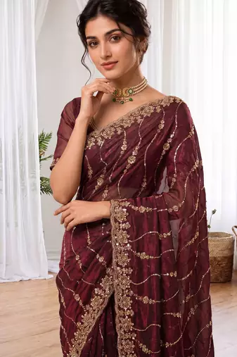 Maroon color elegant space silk fabric rich looks embroidered saree