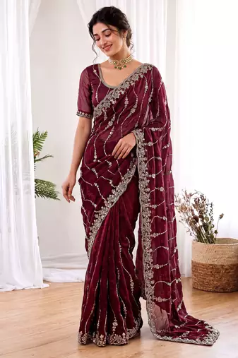 Maroon color elegant space silk fabric rich looks embroidered saree