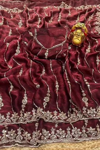 Maroon color elegant space silk fabric rich looks embroidered saree