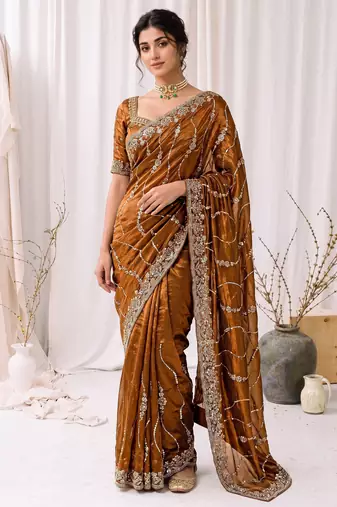 Gold color elegant space silk fabric rich looks embroidered saree