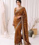 Gold color elegant space silk fabric rich looks embroidered saree
