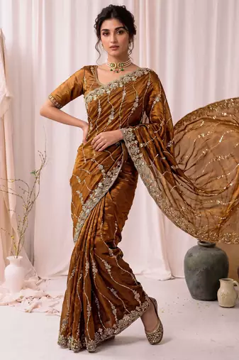 Gold color elegant space silk fabric rich looks embroidered saree