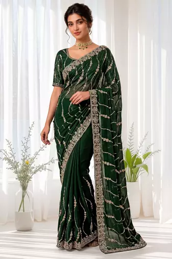 Green color elegant space silk fabric rich looks embroidered saree