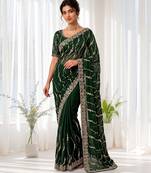 Green color elegant space silk fabric rich looks embroidered saree