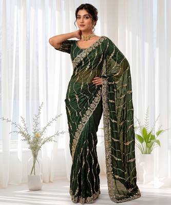 Green color elegant space silk fabric rich looks embroidered saree 4