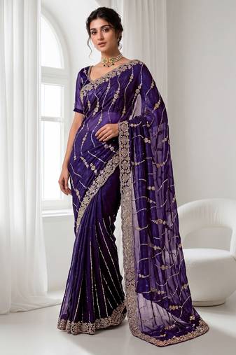 Purple color elegant space silk fabric rich looks embroidered saree