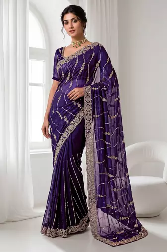 Purple color elegant space silk fabric rich looks embroidered saree