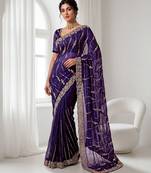 Purple color elegant space silk fabric rich looks embroidered saree