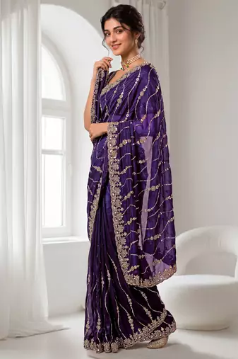Purple color elegant space silk fabric rich looks embroidered saree