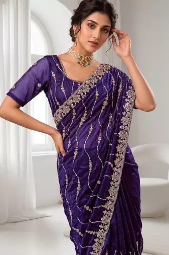 Purple color elegant space silk fabric rich looks embroidered saree