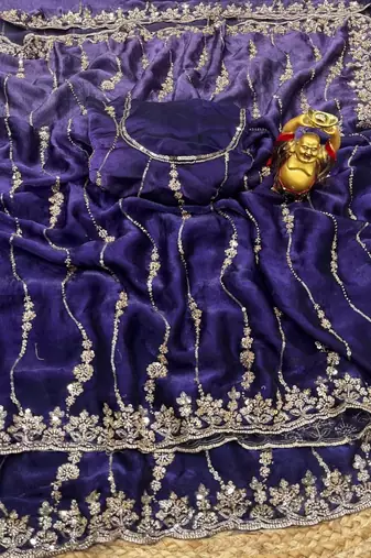 Purple color elegant space silk fabric rich looks embroidered saree