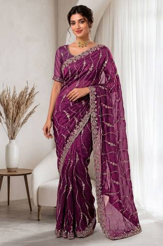 Burgundy color elegant space silk fabric rich looks embroidered saree
