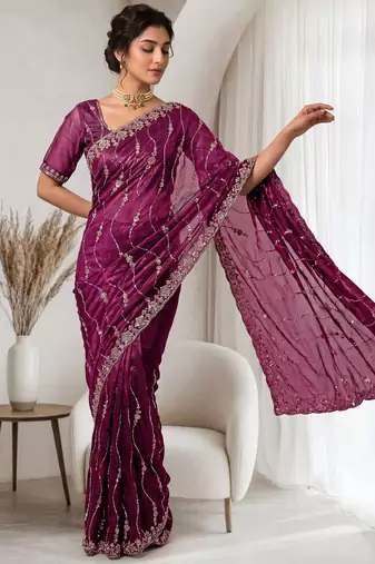 Burgundy color elegant space silk fabric rich looks embroidered saree