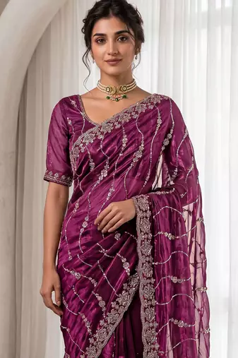Burgundy color elegant space silk fabric rich looks embroidered saree