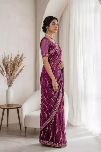 Burgundy color elegant space silk fabric rich looks embroidered saree