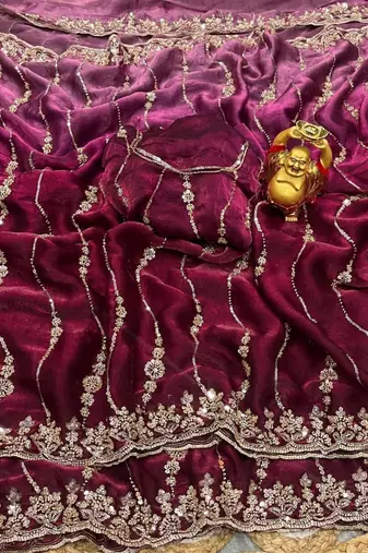 Burgundy color elegant space silk fabric rich looks embroidered saree