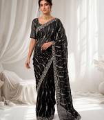 Black color elegant space silk fabric rich looks embroidered saree