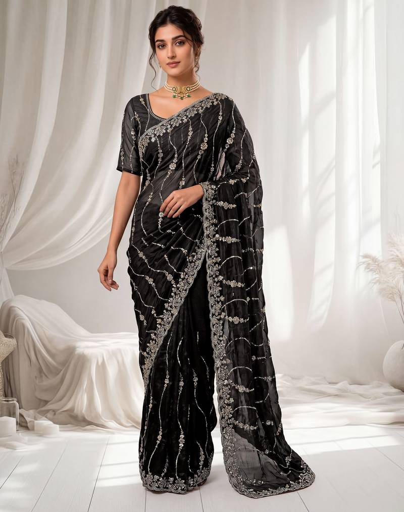 Black color elegant space silk fabric rich looks embroidered saree