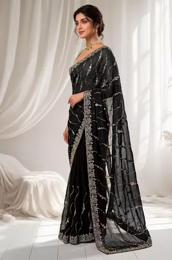 Black color elegant space silk fabric rich looks embroidered saree