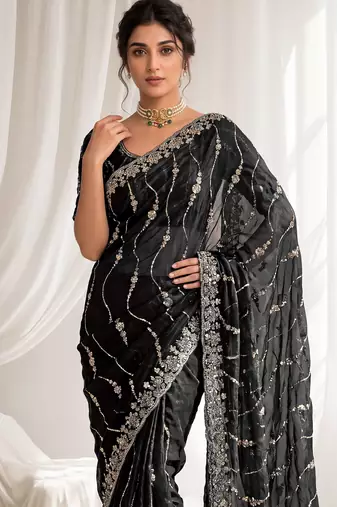 Black color elegant space silk fabric rich looks embroidered saree