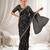 Black color elegant space silk fabric rich looks embroidered saree